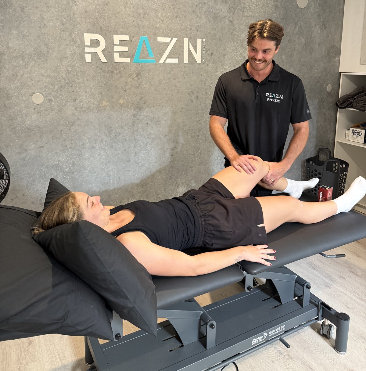 Connor delivering physiotherapy treatment at REAZN Collective, Berkeley Vale
